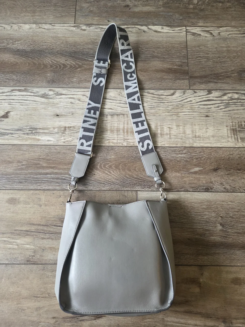 Stella McCartney Light Gray Perforated Logo Shoulder Bag with Branded Strap